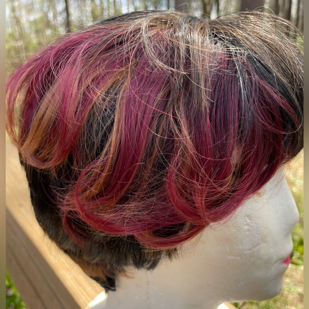 Short Brown Wig with Some burgundy and orange highlights very unique & cool.